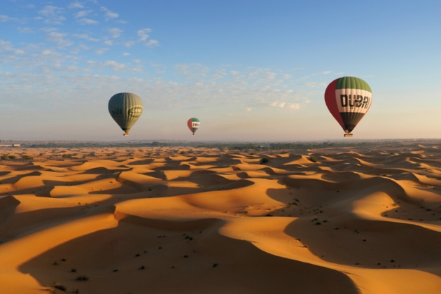 Experience a breathtaking hot air balloon ride above Dubai’s desert dunes